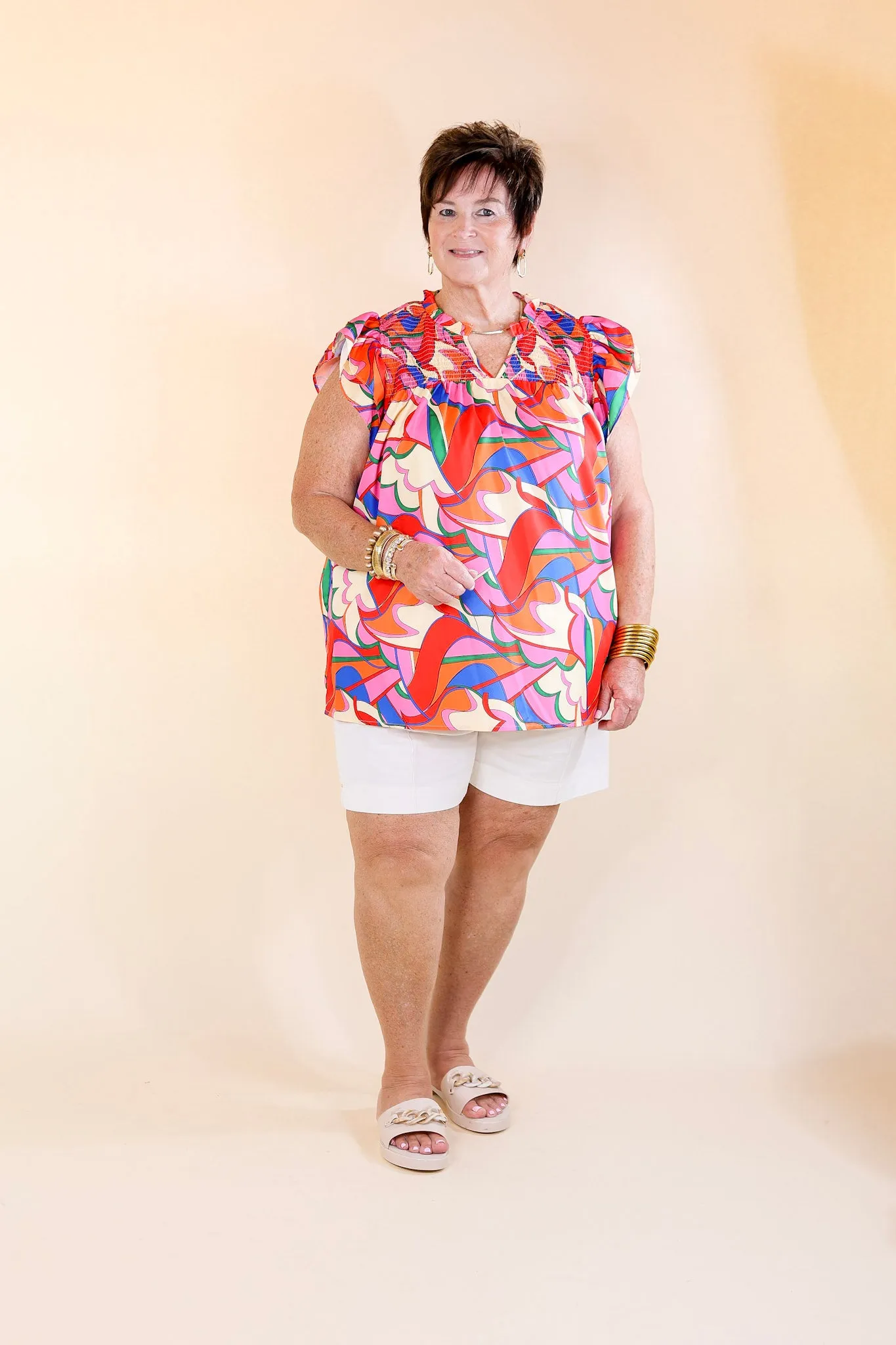 Lovely Line Up Abstract Print Top with Ruffle Cap Sleeves in Pink, Red, Blue and Cream Mix